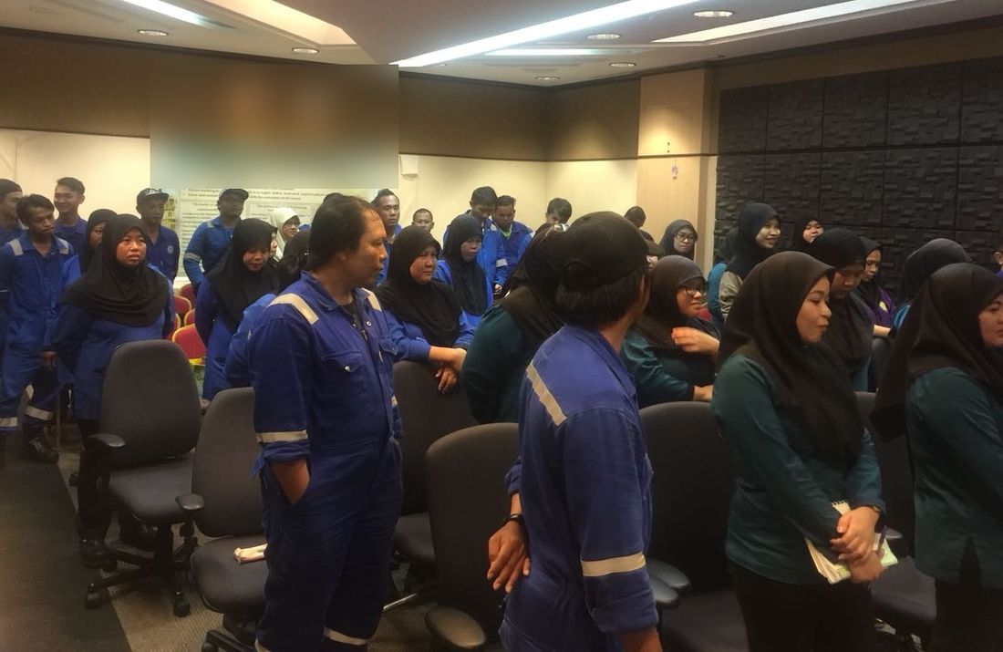 SHYT cleaning team at a pre-work briefing