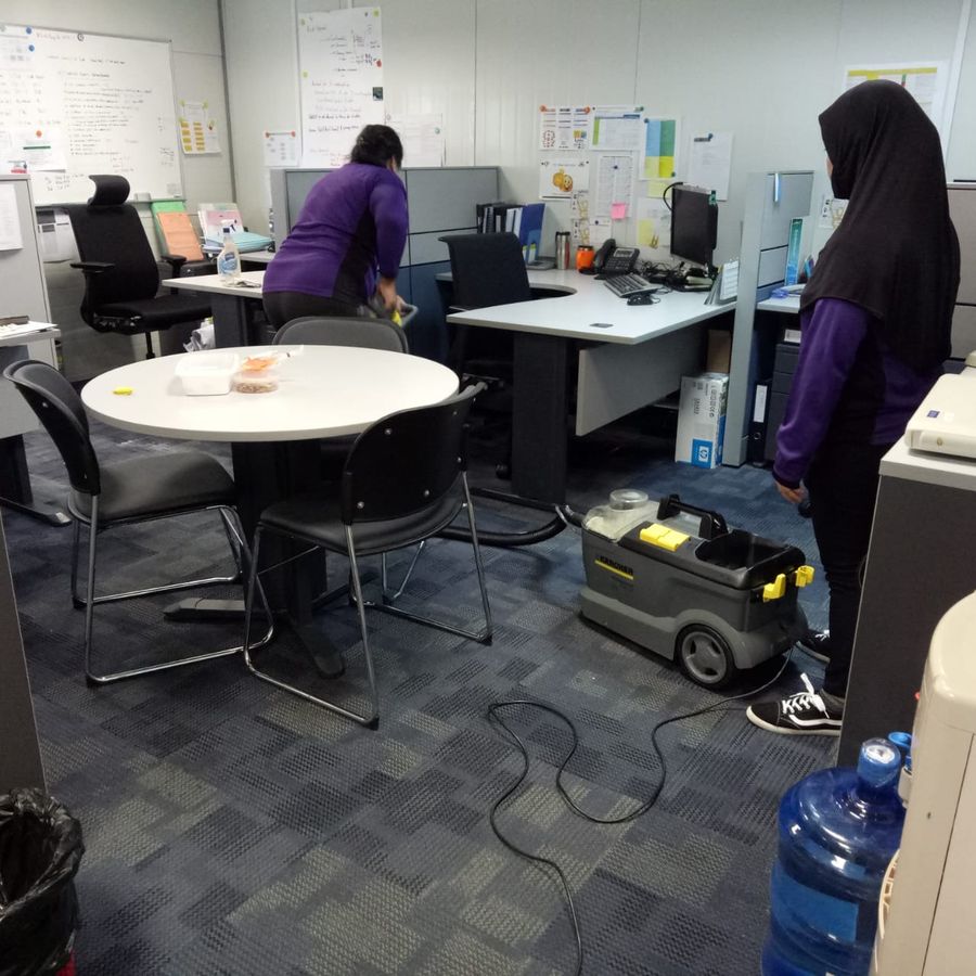 SHYT cleaning team deep cleaning an open-plan office
