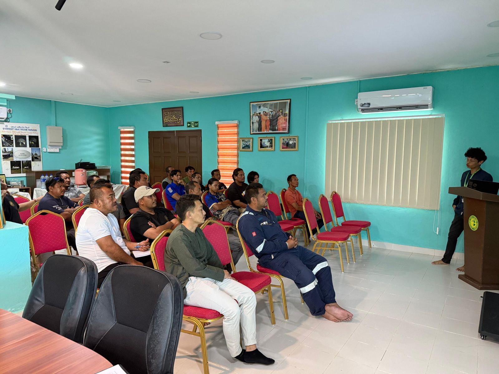 SHYT staff at a training session in the site office